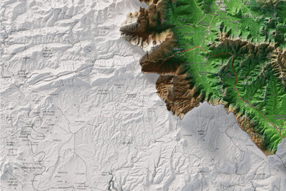Mapa de relleu de la Garrotxa, amb el territori en color i l’entorn en blanc. Detall de la part inferior esquerra. 61 × 91 cm. Estil Clàssic.
