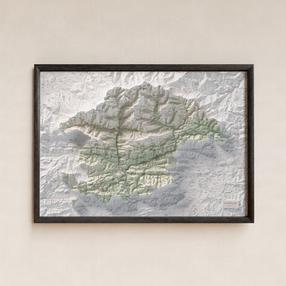 Mapa de relleu del Ripollès, amb el territori en color i l’entorn en blanc. Presentació amb marc. 70 × 100 cm. Estil Cartogràfic.
