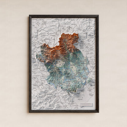 Mapa de relieve del Vallès Occidental, con el territorio en color y el entorno en blanco. Presentación con marco. 21 × 30 cm. Estilo Azul y naranja.